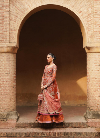 "Delicate Floral Rust Pishwas Ensemble with Screen Printed Sharara and Pink Scalloped Net Dupatta"