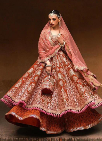 "Delicate Floral Rust Pishwas Ensemble with Screen Printed Sharara and Pink Scalloped Net Dupatta"