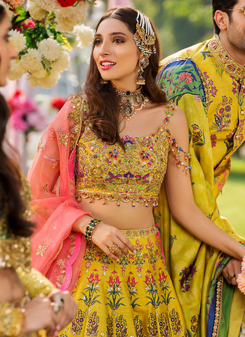 Bedazzled Choli with Floral Lehnga and Coral Pink Organza Dupatta