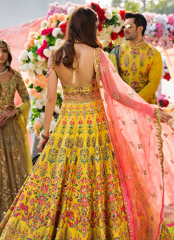 Bedazzled Choli with Floral Lehnga and Coral Pink Organza Dupatta