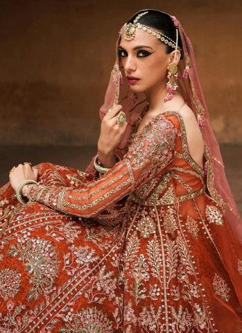 "Delicate Floral Rust Pishwas Ensemble with Screen Printed Sharara and Pink Scalloped Net Dupatta"