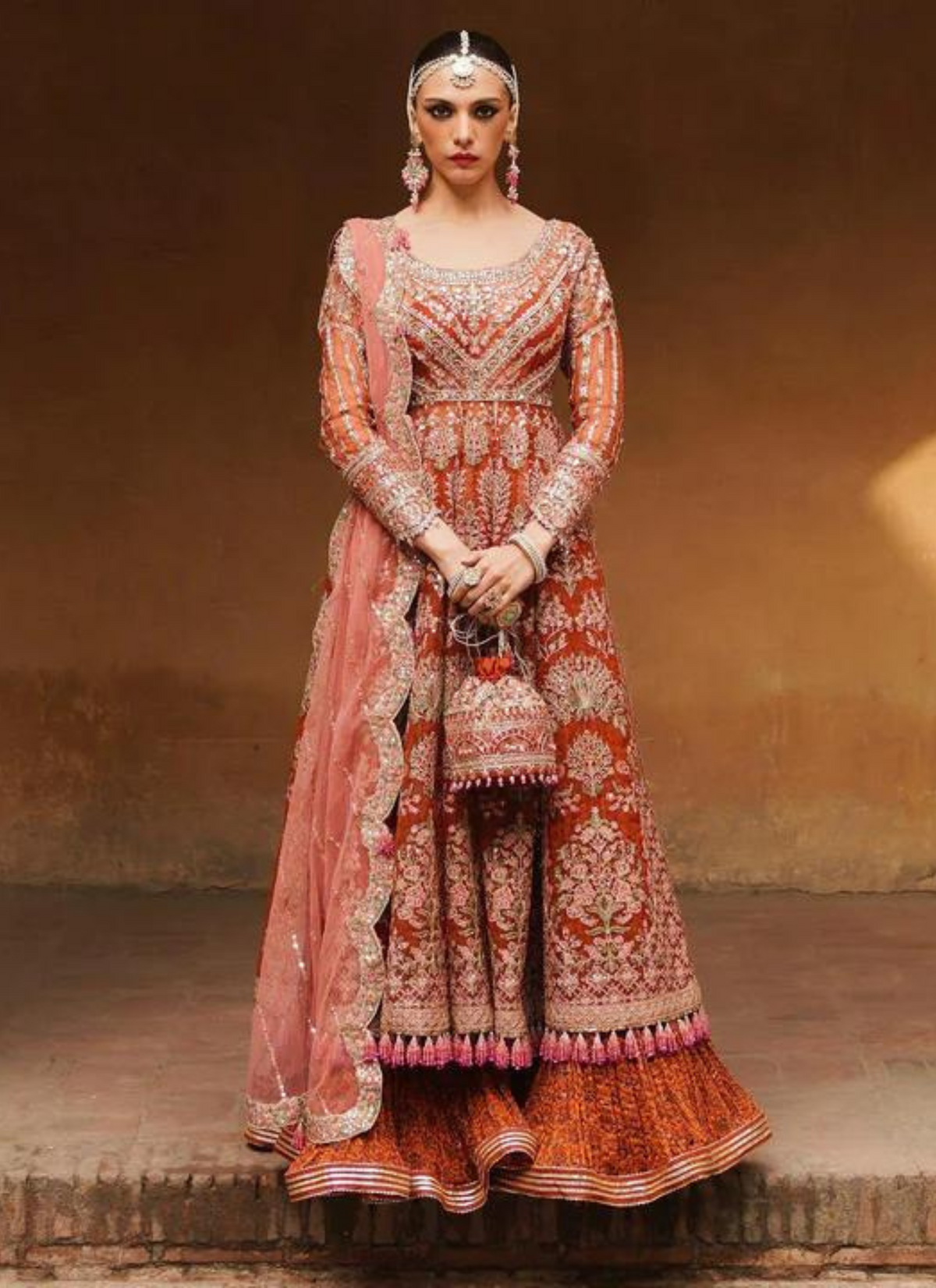 "Delicate Floral Rust Pishwas Ensemble with Screen Printed Sharara and Pink Scalloped Net Dupatta"